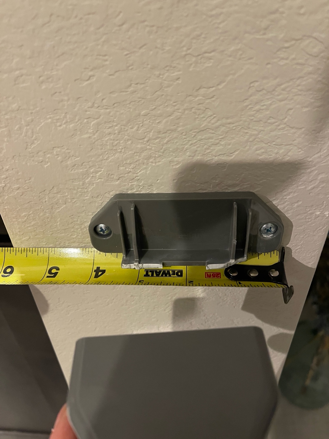 Broken wall mount piece